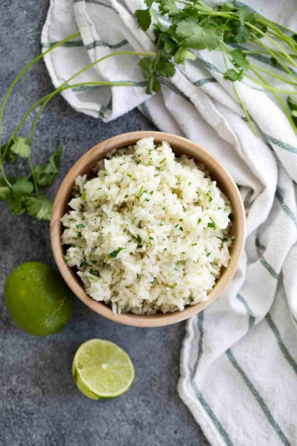 overhead view of wooden bowl with cilantro lime rice