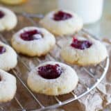 Cranberry Thumbprint Cookies on a cooling rack