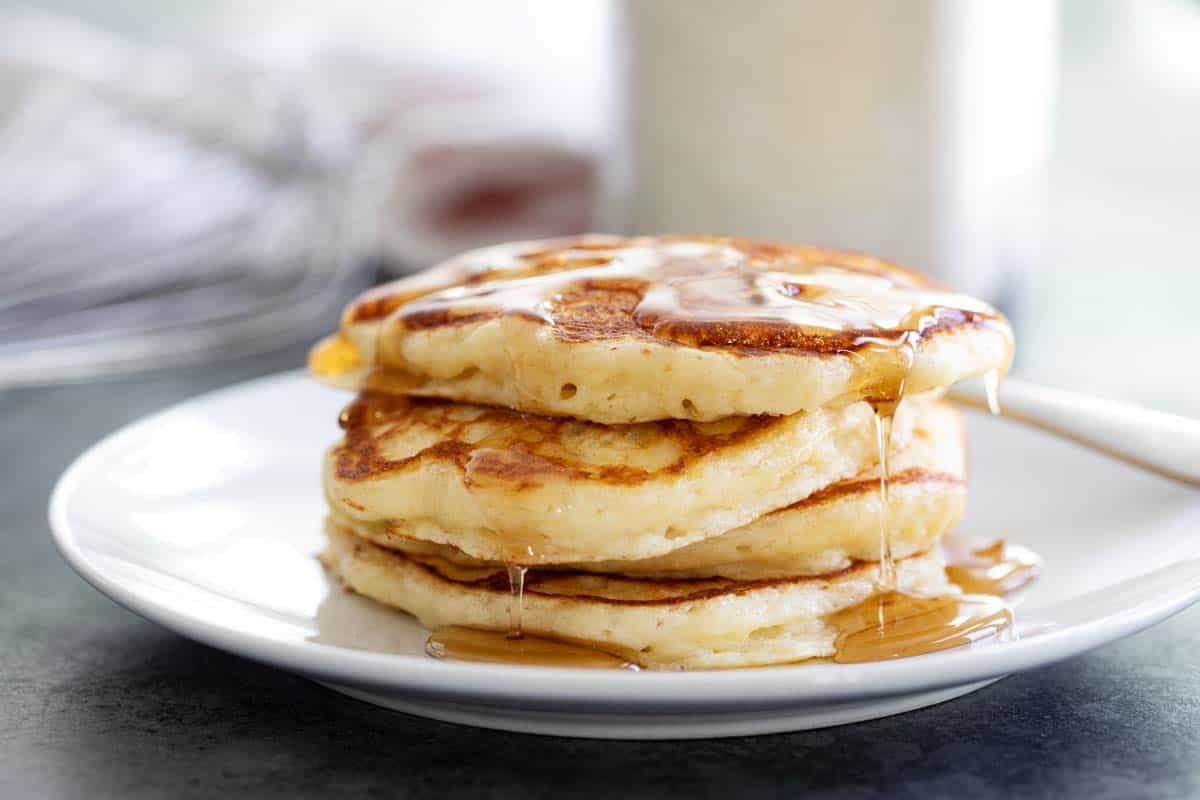 plate of pancakes with syrup