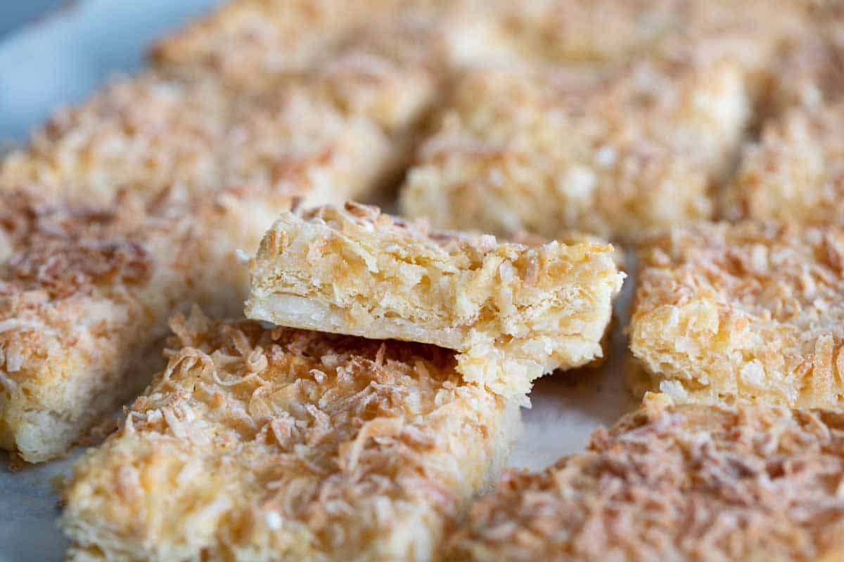 stack of coconut bars showing texture of a bar from the side