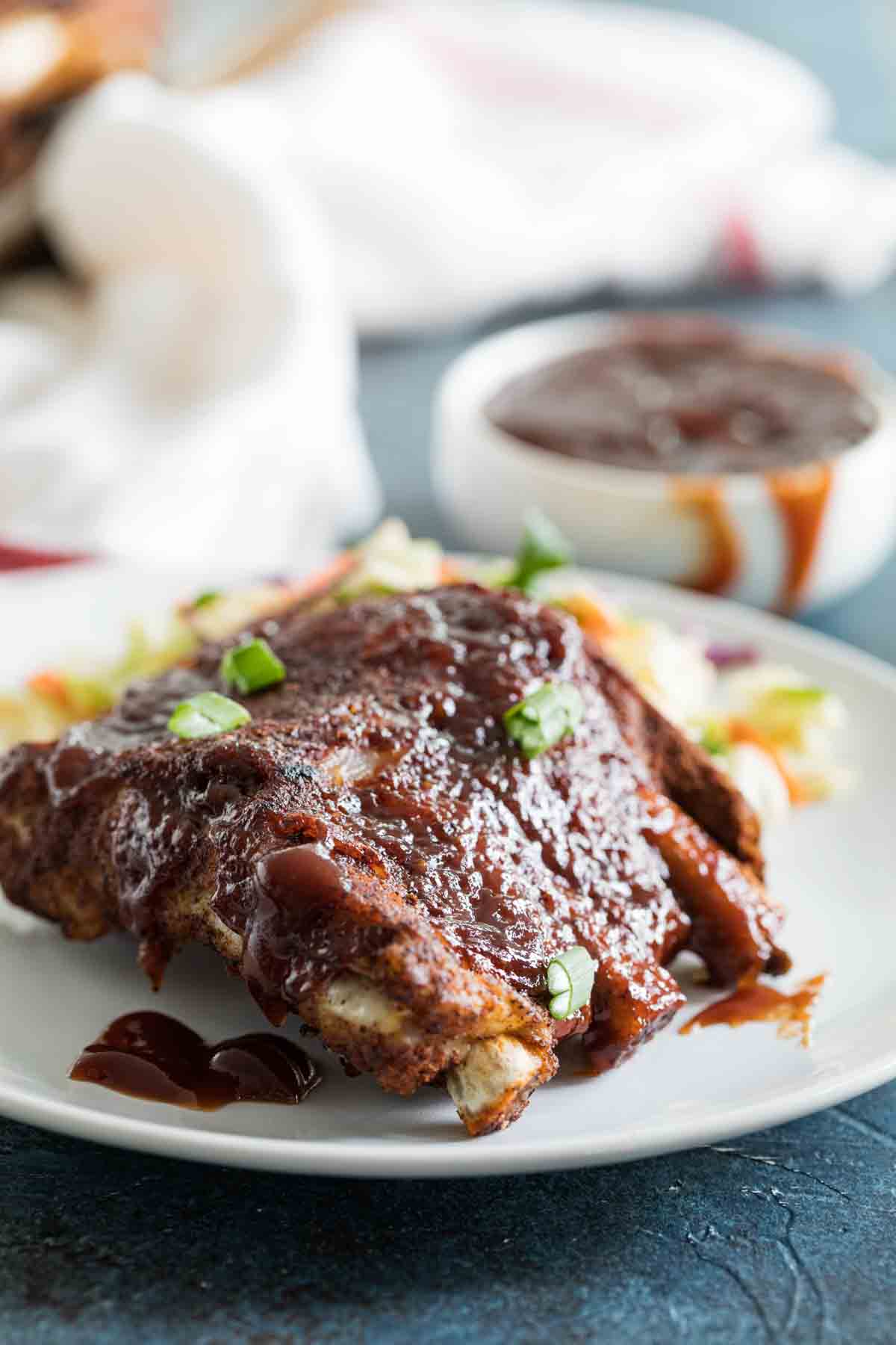 Instant pot ribs with barbecue sauce on a plate