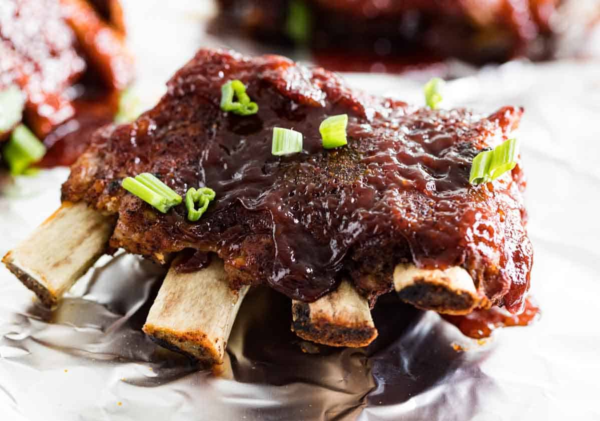 cooked instant pot ribs sprinkled with green onions