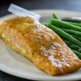 Honey Mustard Salmon Fillet on a plate with green beans