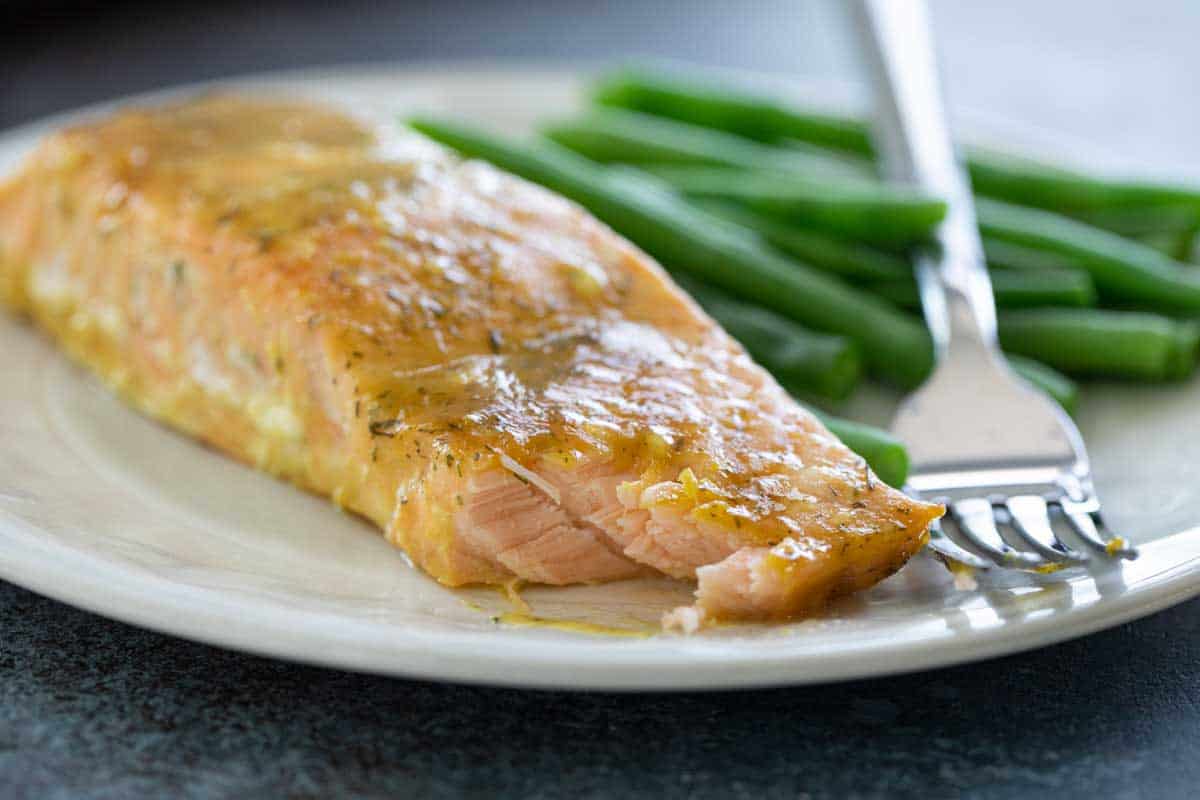 honey mustard salmon filet with bite taken to show texture