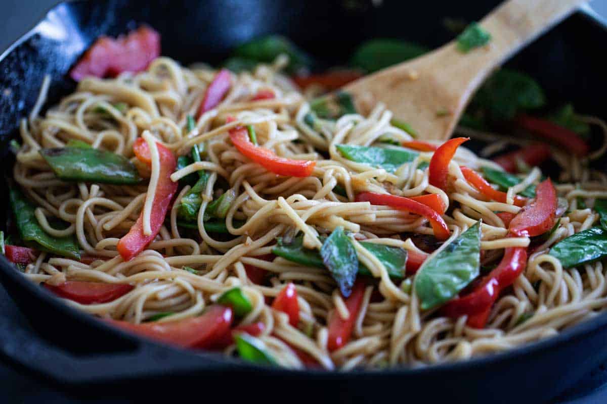 skillet with Chinese noodles and vegetables