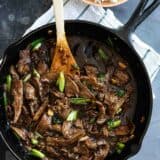 mongolian beef in a cast iron skillet