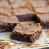 homemade brownies on parchment paper