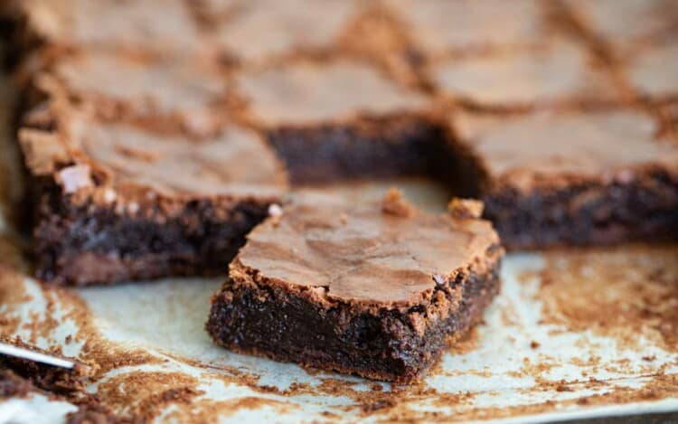 homemade brownies on parchment paper