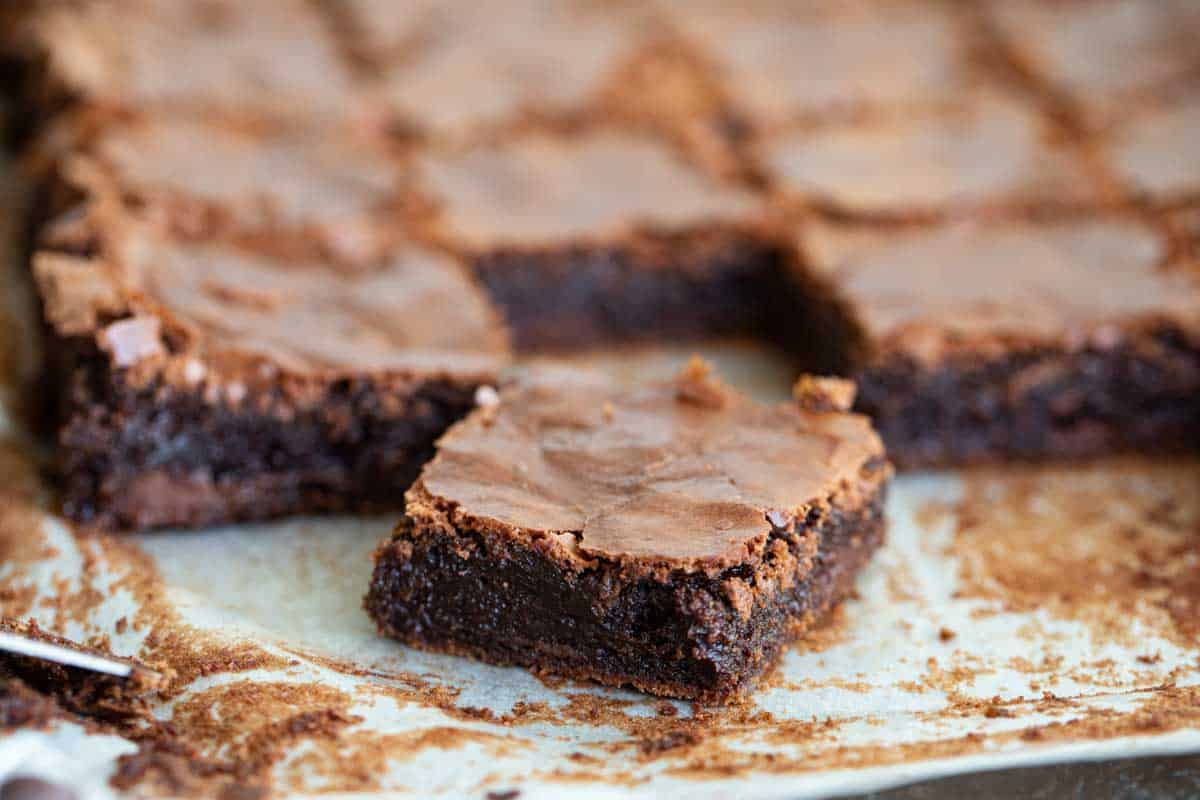 homemade brownies on parchment paper