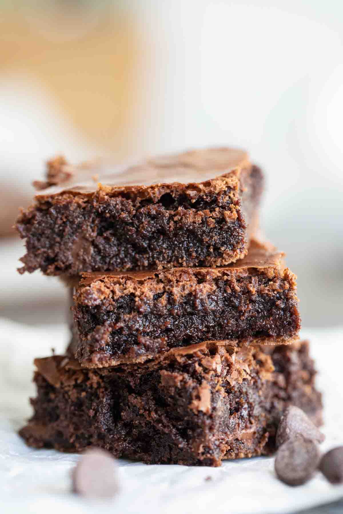 three fudgy brownies stacked