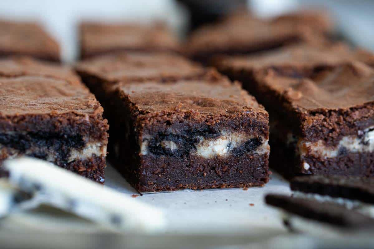 Sliced Oreo Brownies showing the cookies and cream filling