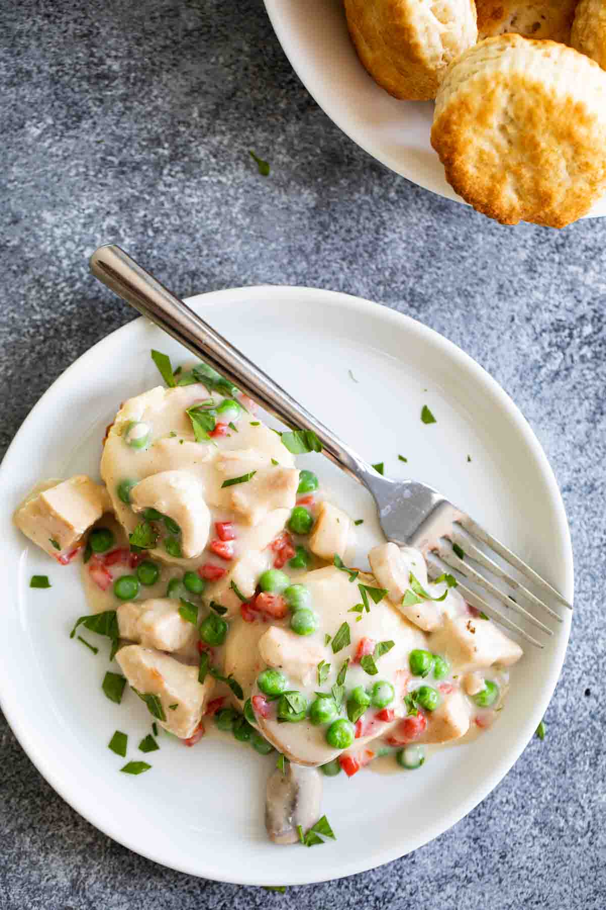 overhead view of biscuits topped with chicken gravy