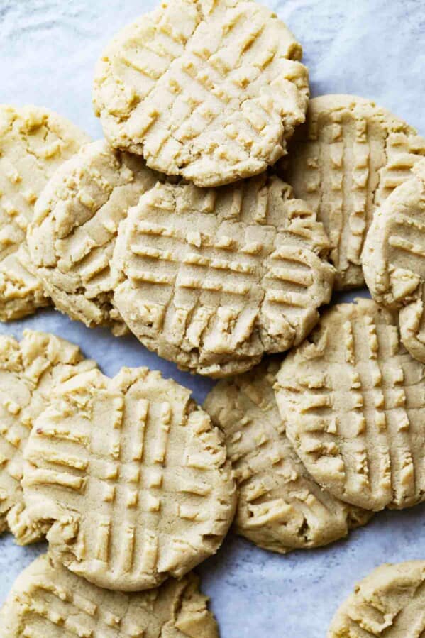 overhead view of peanut butter cookies stacked
