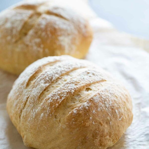 2 loaves of artisan bread on parchment paper