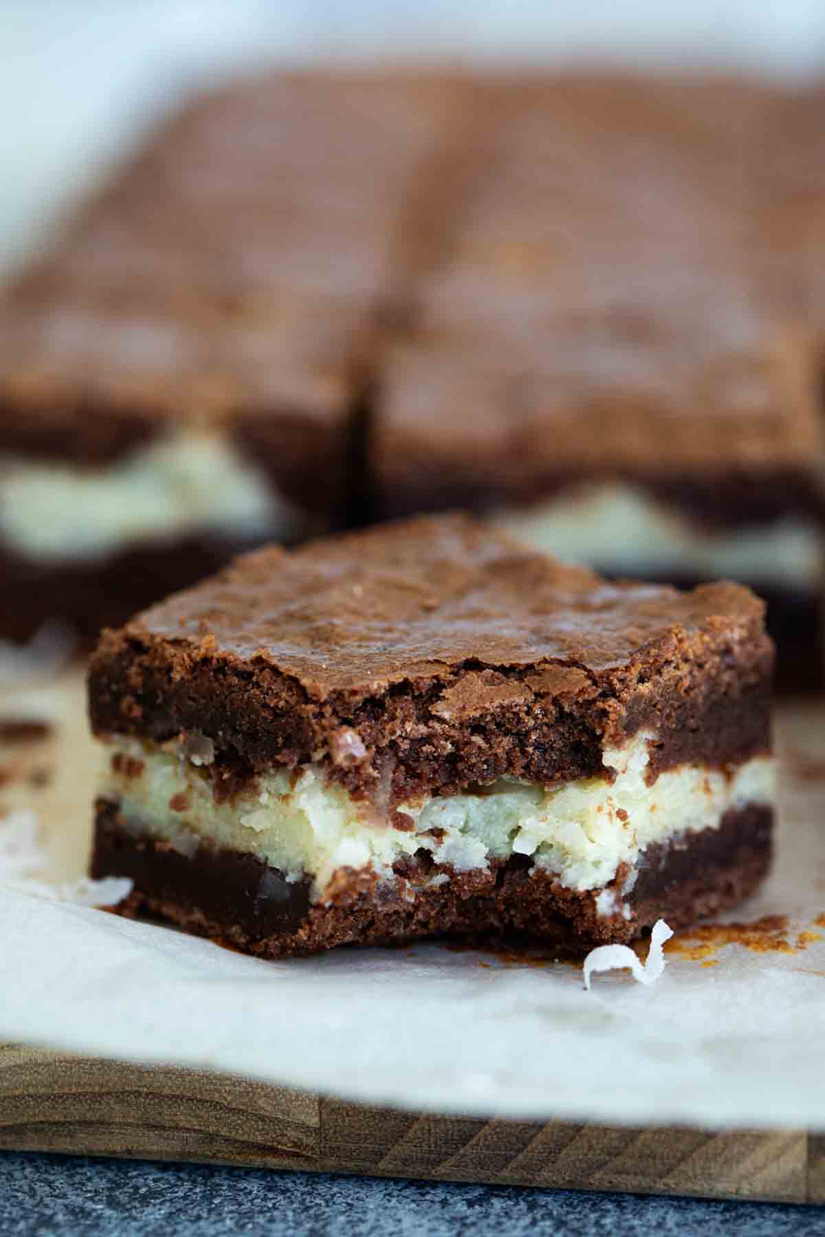 coconut brownie with bite taken out