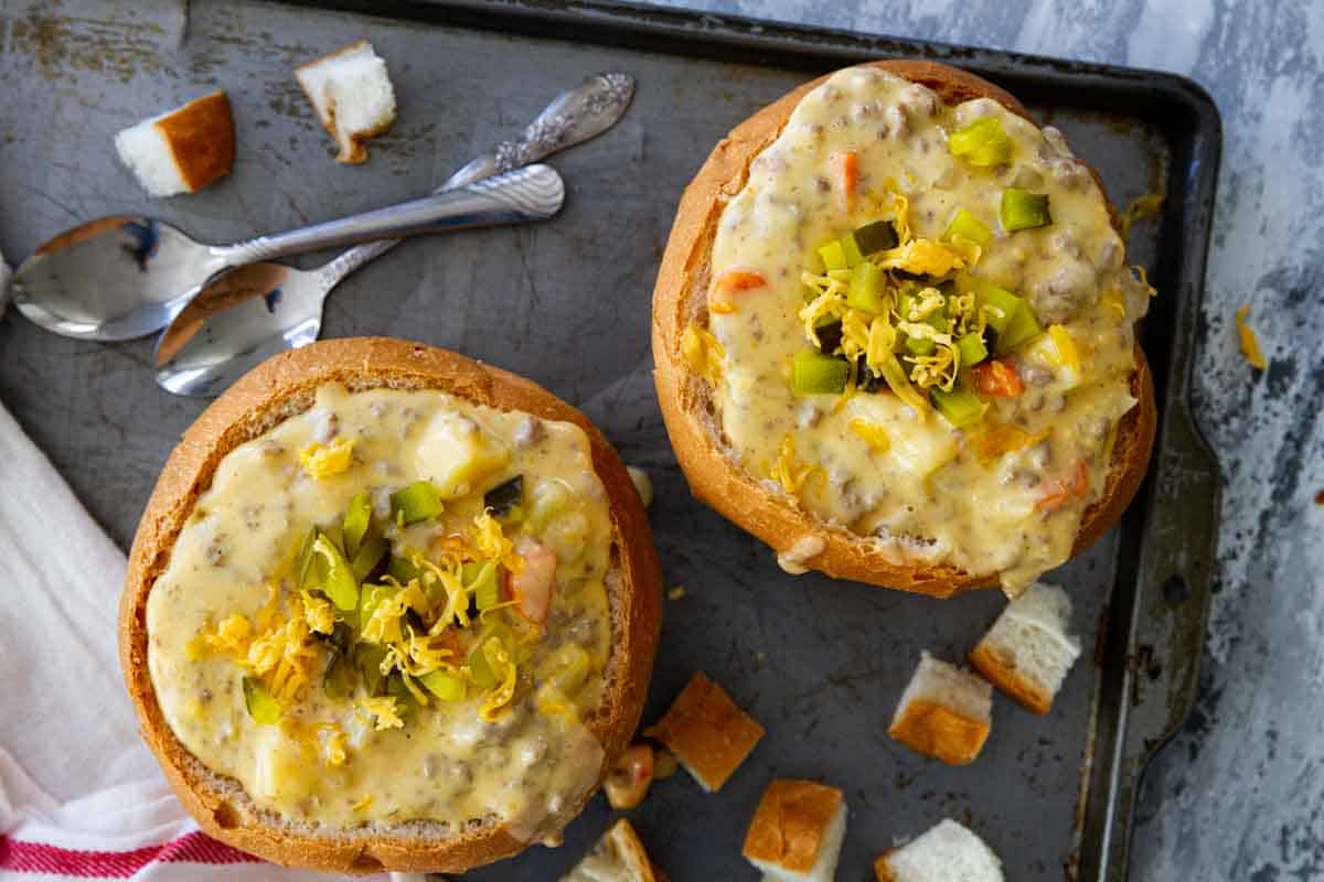 overhead view of Crock Pot Cheeseburger Soup on a baking sheet