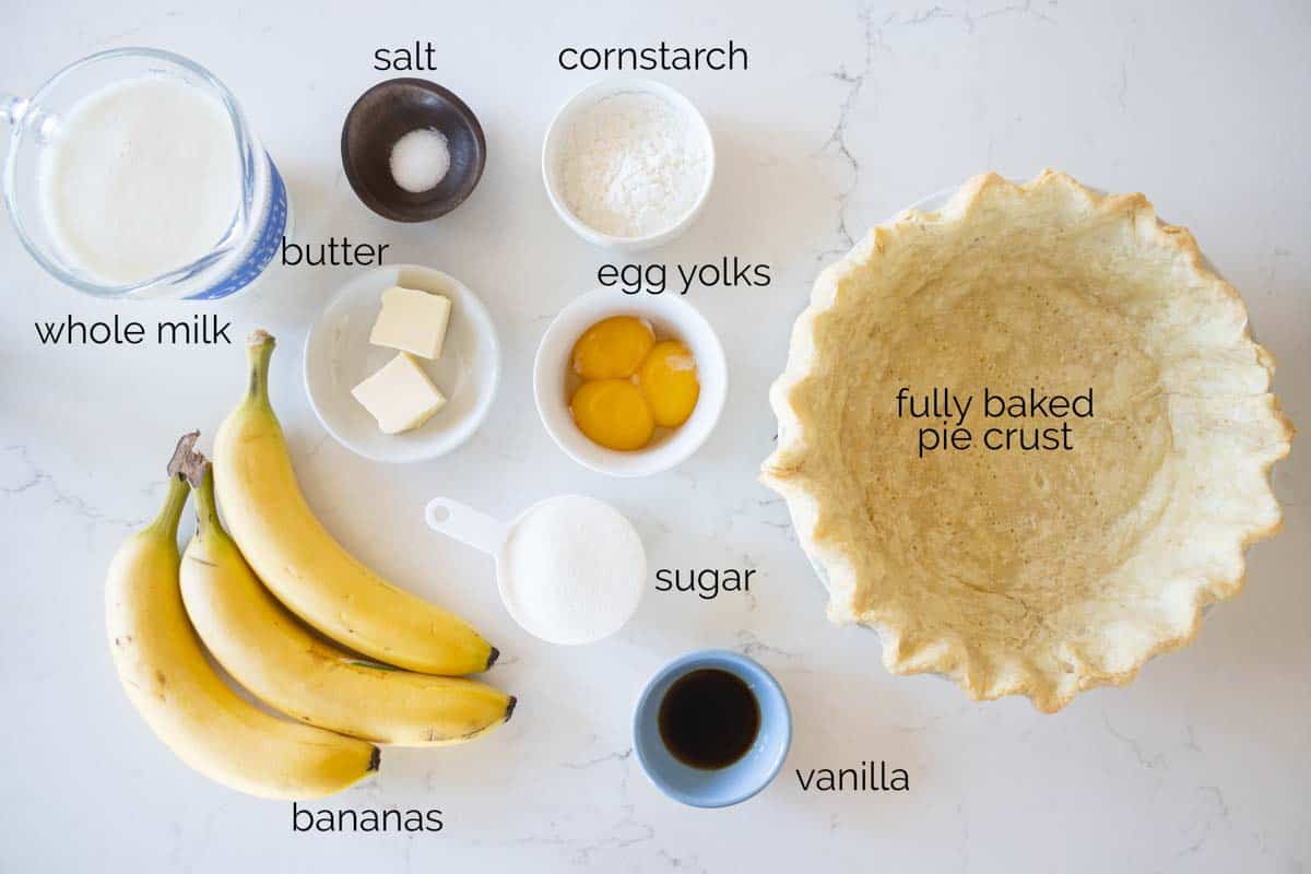This Banana Cream Pie recipe has a creamy, smooth vanilla filling, bananas, and freshly whipped cream. You get so much banana flavor, all from scratch! ingredients to make a banana cream pie