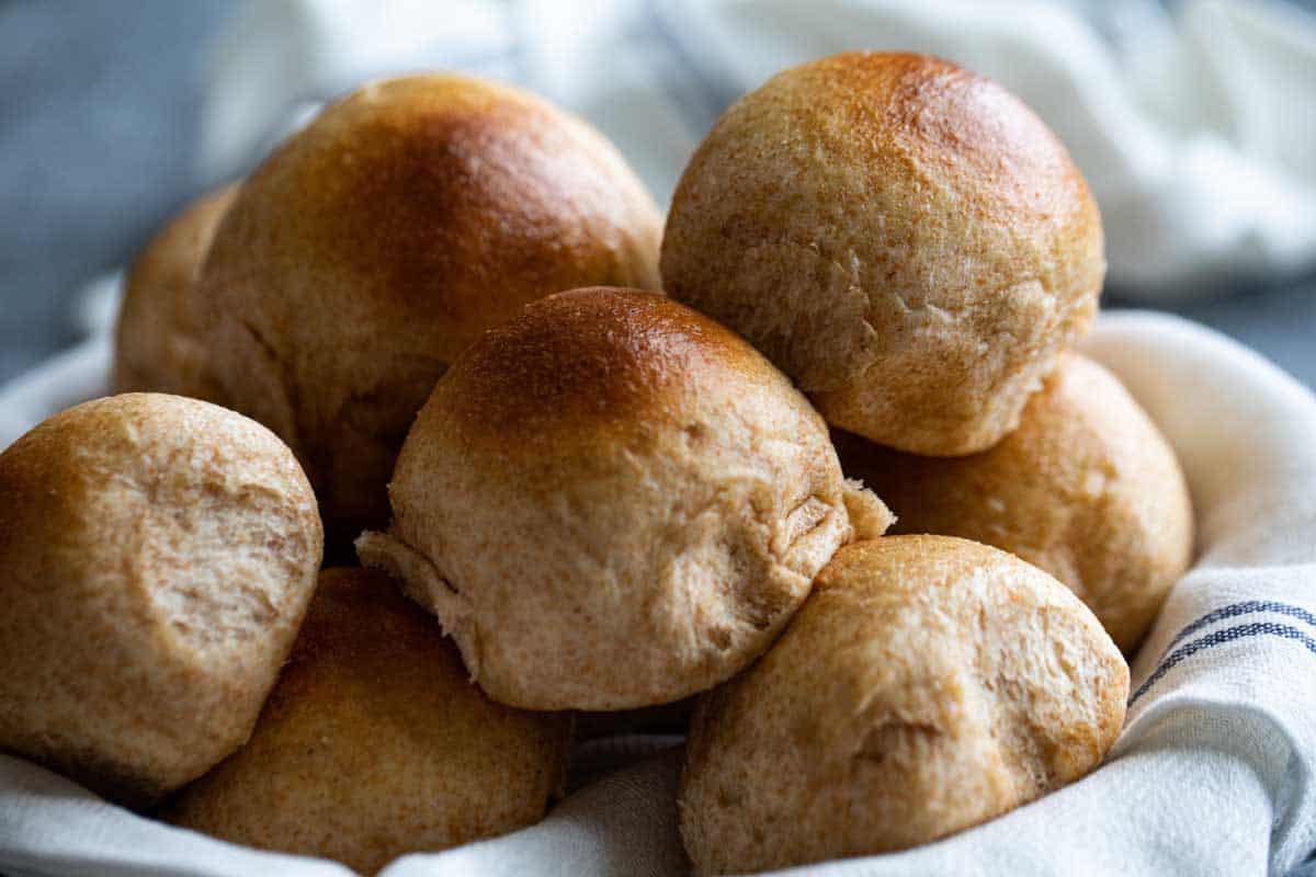 basket full of whole wheat rolls