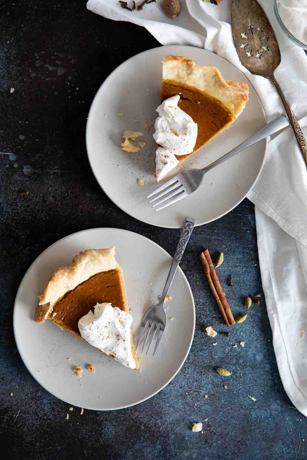 overhead view of 2 slices of pumpkin pie
