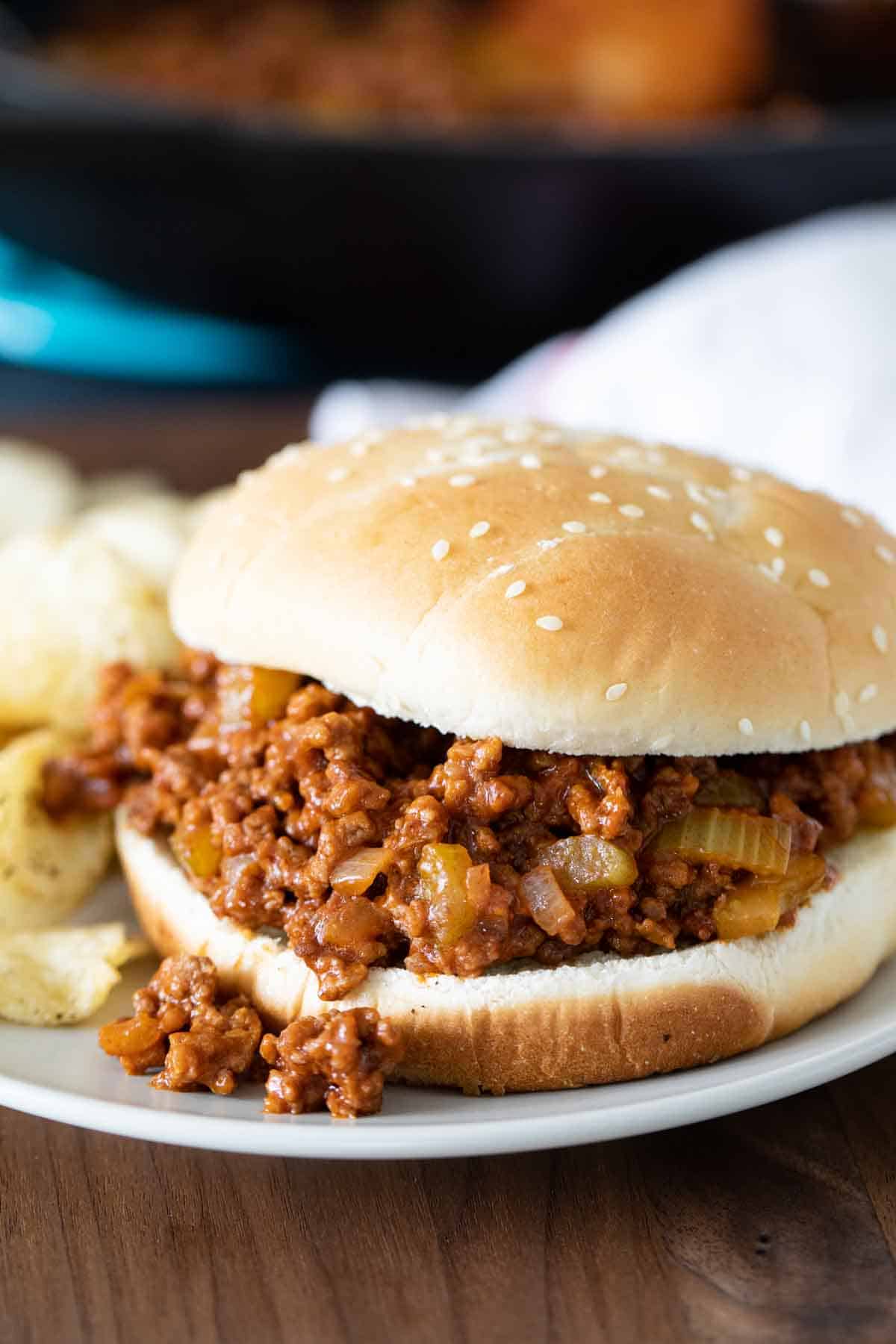 close up of sloppy joe with filling overflowing