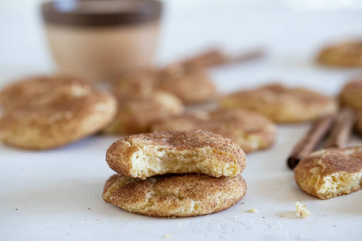 snickerdoodles with bite taken from one to show the texture