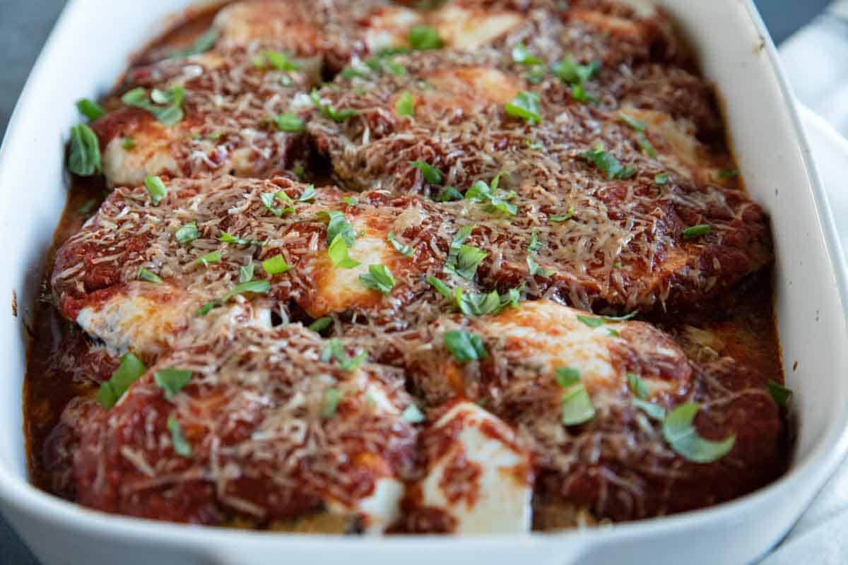 view of eggplant parmesan in a casserole dish.