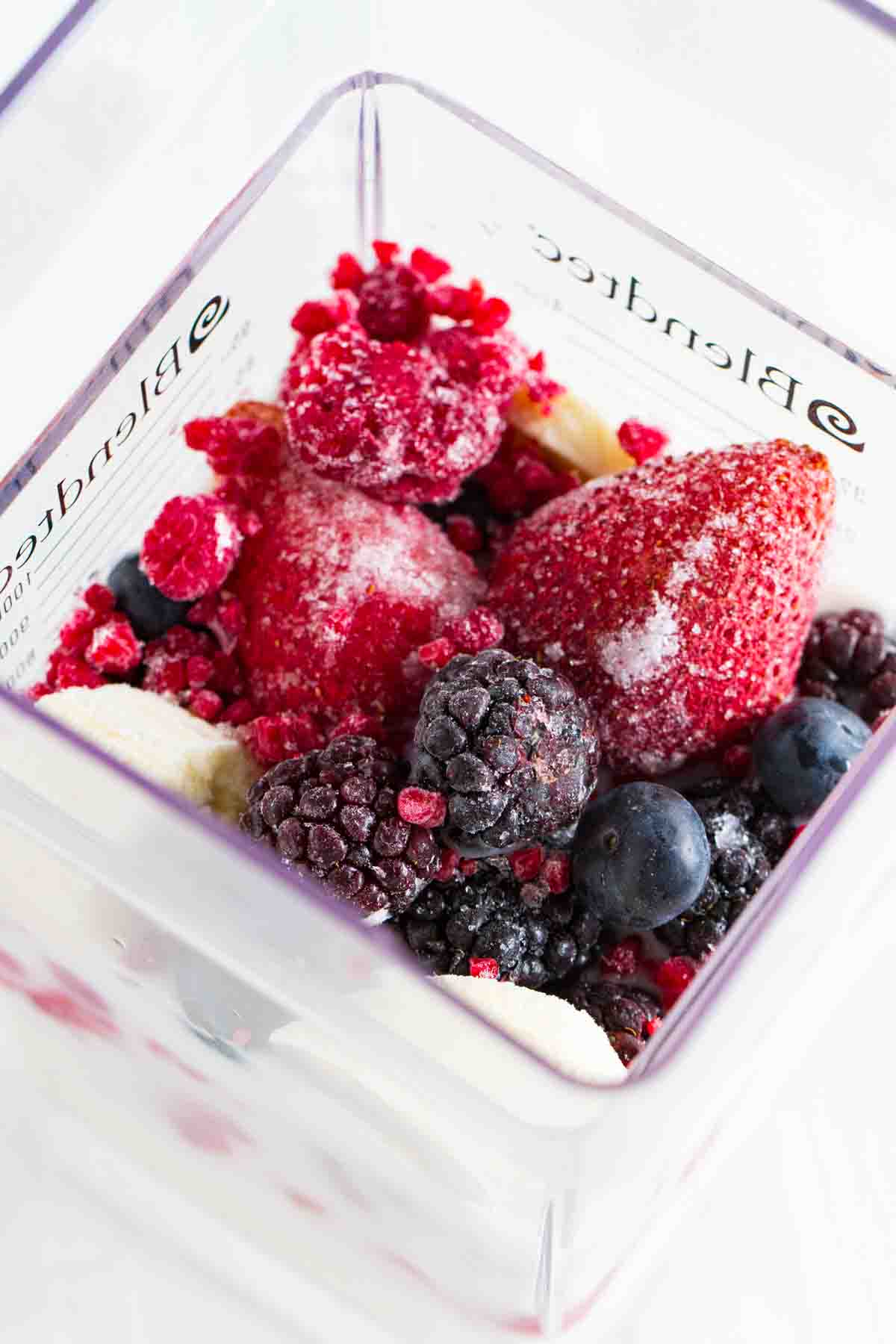 berries and bananas in a blender