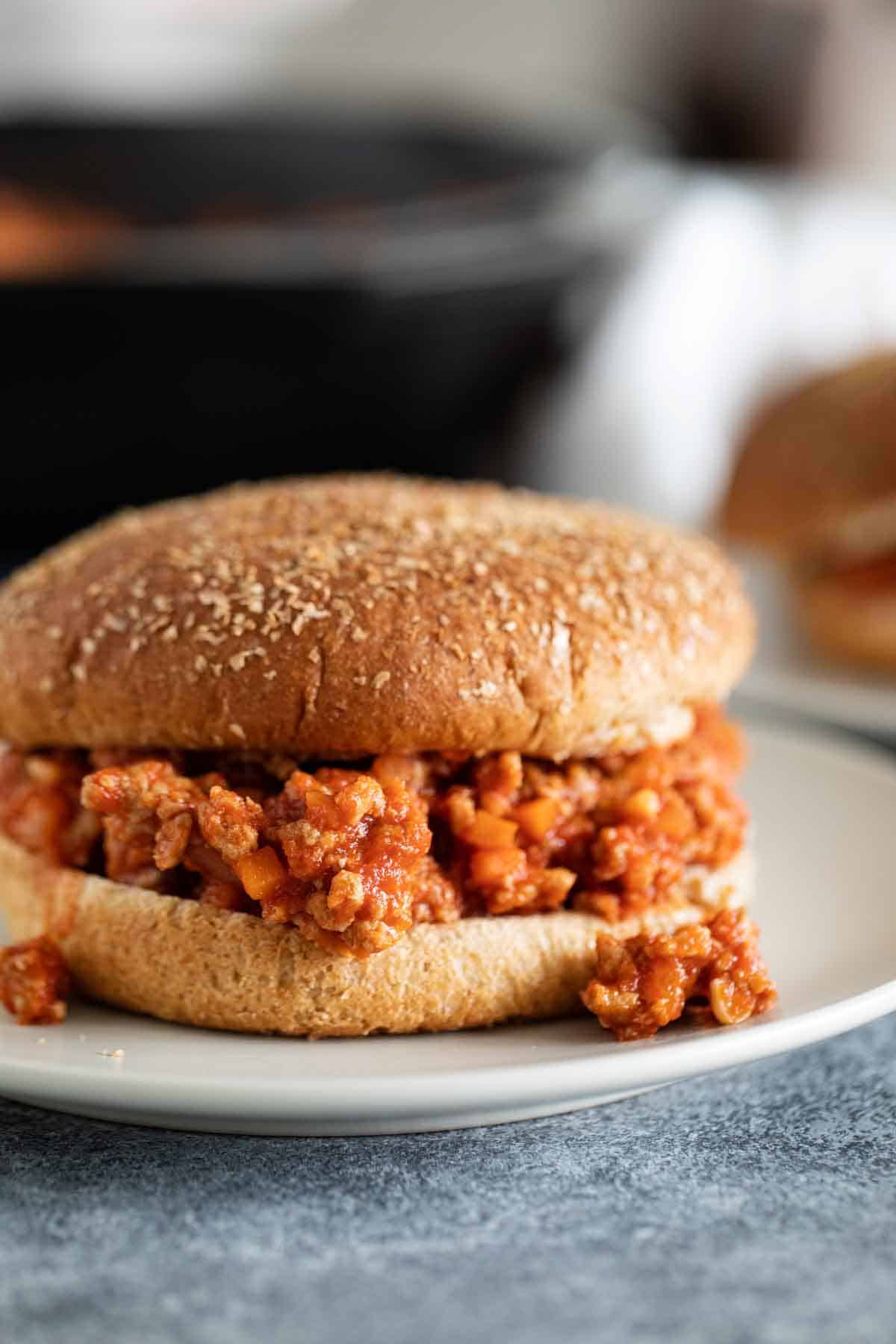 close up of turkey sloppy joe on a whole wheat bun