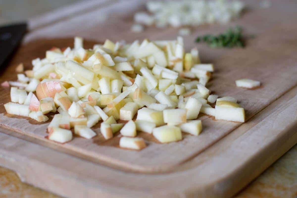 diced apple on a cutting board