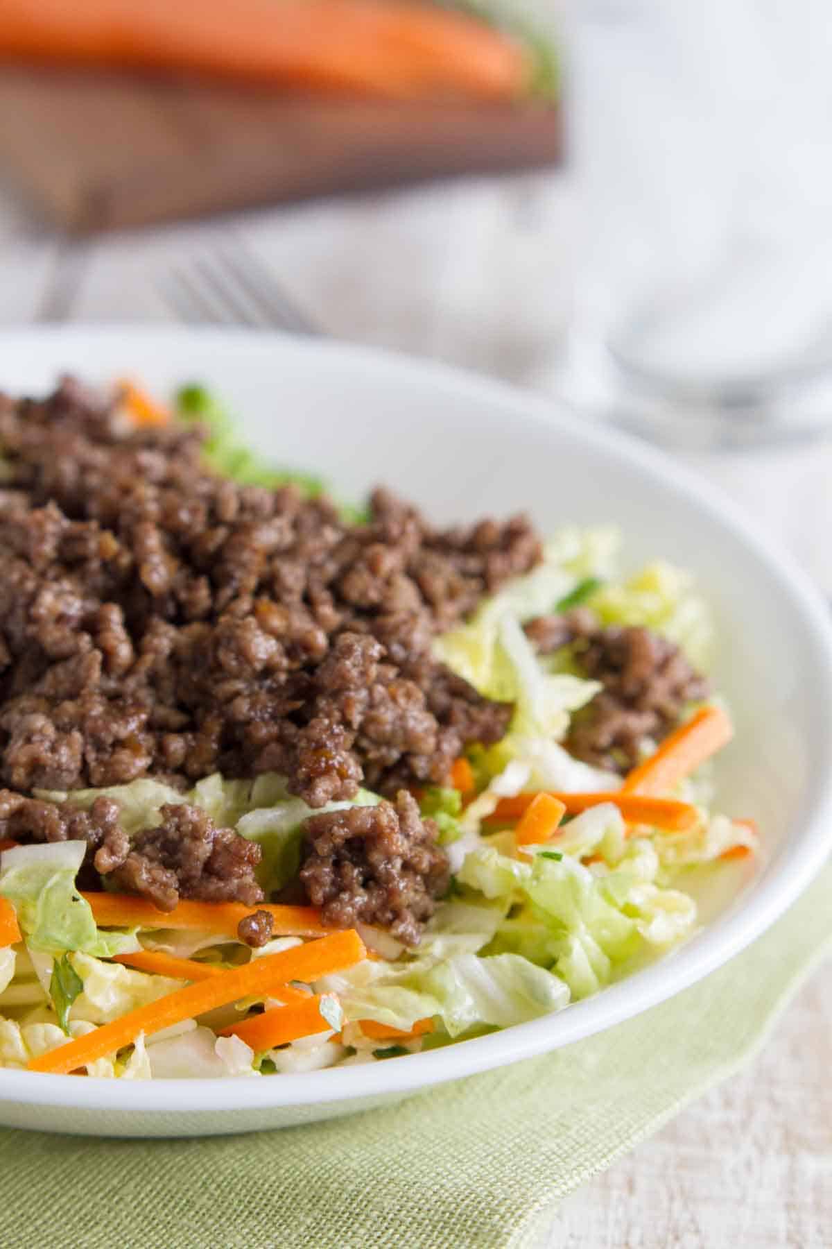 bowl filled with Asian Beef and Cabbage Salad