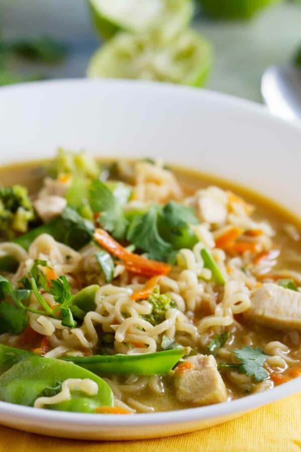 Asian Chicken Noodle Soup in a white bowl on a napkin