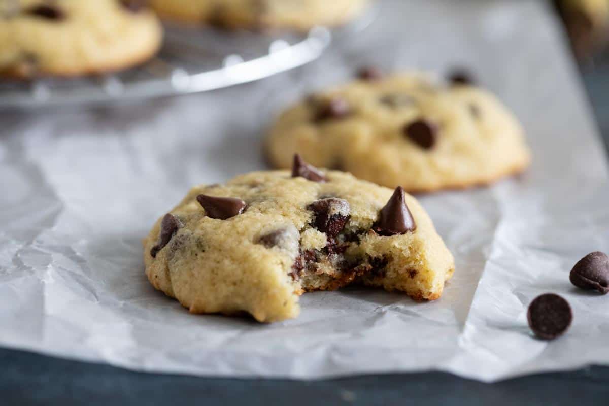 banana chocolate chip cookie with a bite taken from it