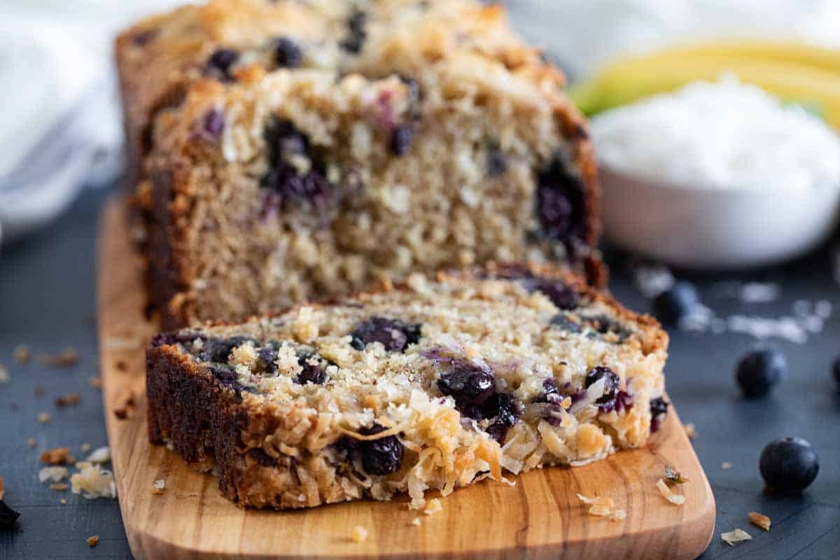 showing texture of a slice of blueberry banana bread with coconut.