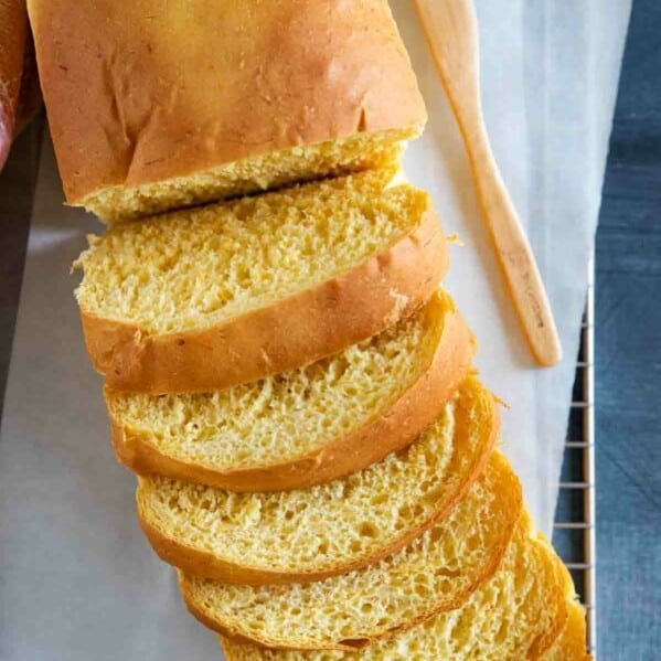 Overhead view of sliced loaf of butternut squash bread.