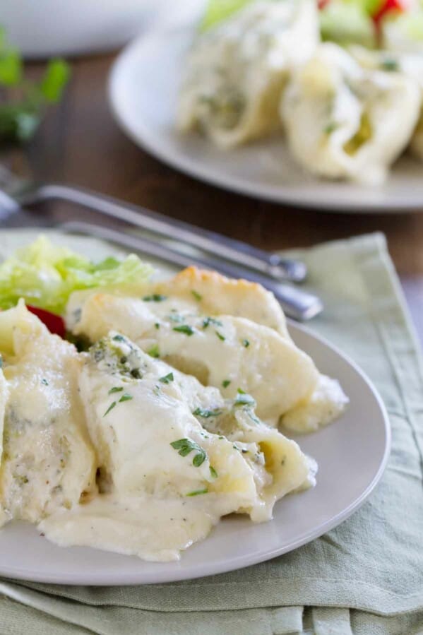 plate with a serving of chicken alfredo stuffed shells