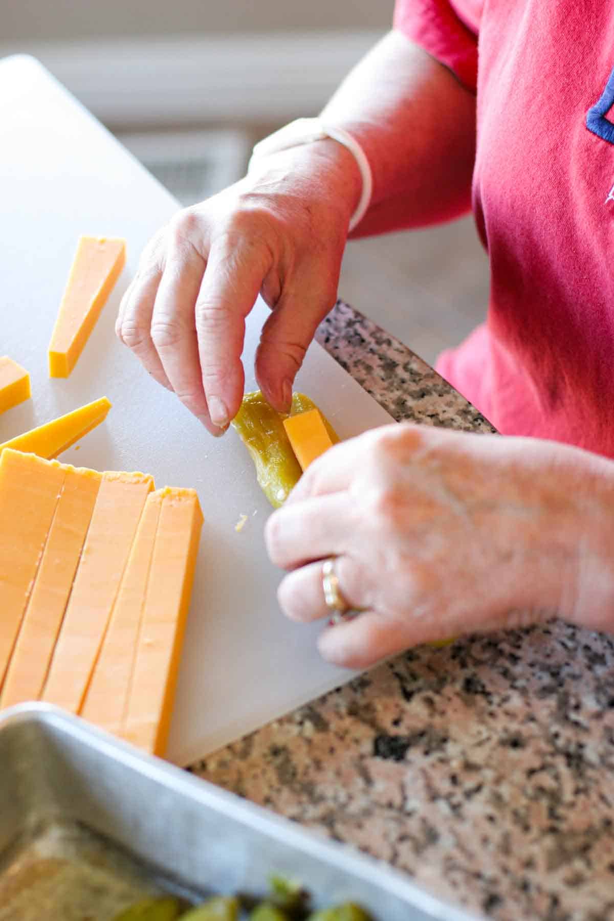 stuffing cheese inside a chile