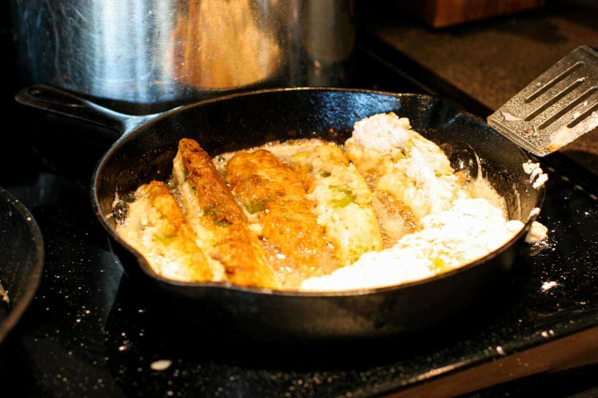 frying chile rellenos