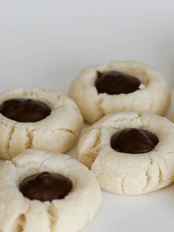 Chocolate Thumbprints - cookies with chocolate filling on a white background