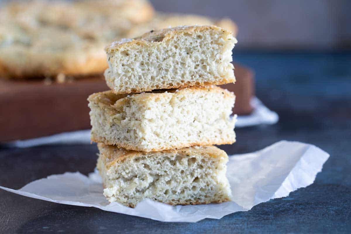 slices of focaccia bread stacked on top of each other