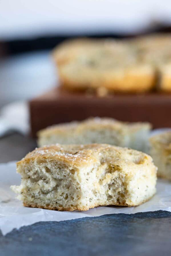 piece of Focaccia Bread with a bite taken from it