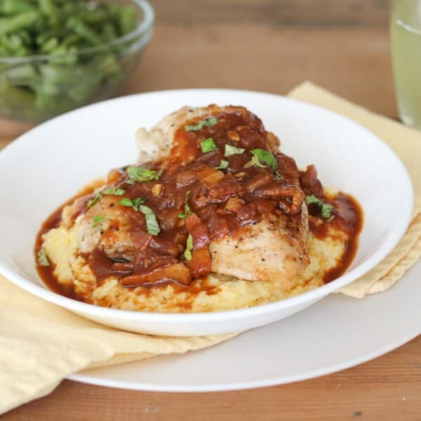 Italian BBQ Chicken with Polenta in a shallow bowl