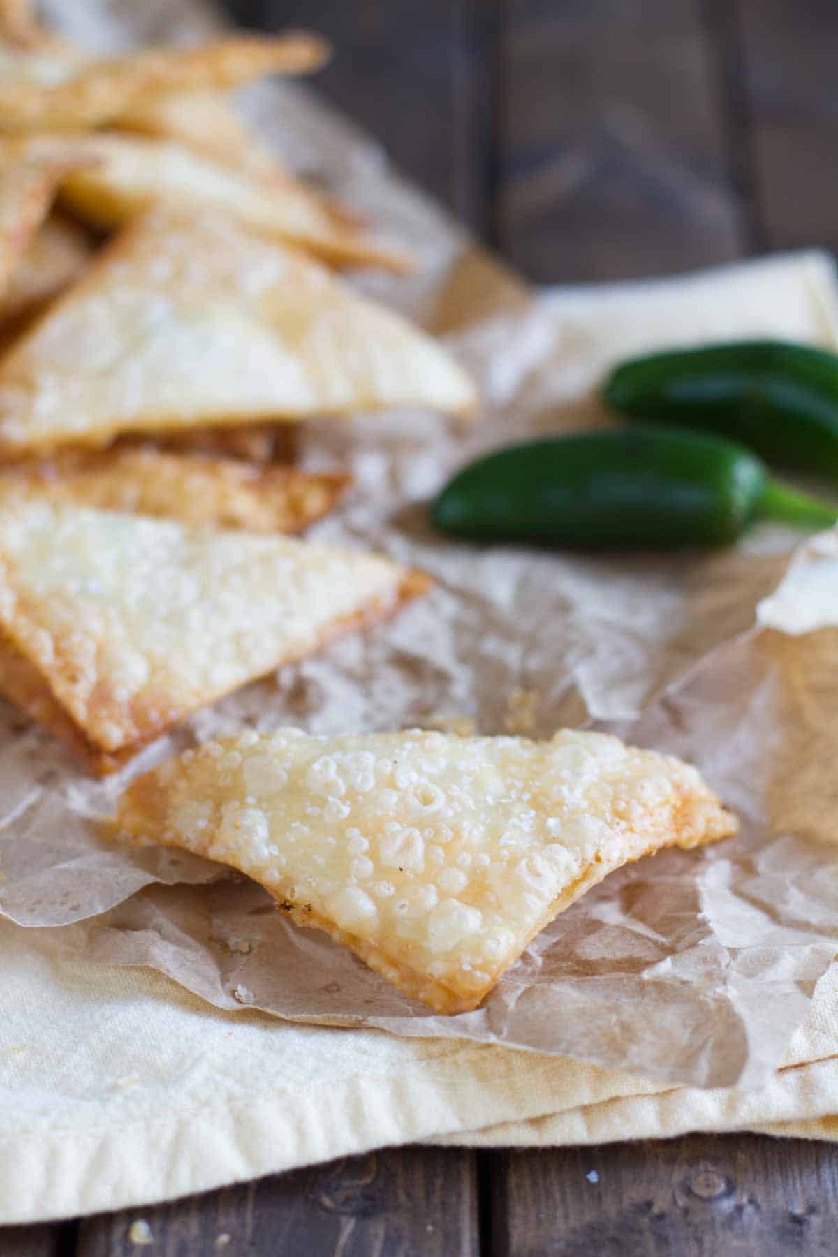 Jalapeno Popper Wontons on brown paper