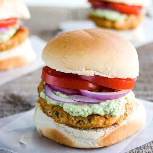 Southwestern Bean Burgers with avocado mayonnaise, tomatoes, and red onions