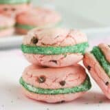 Watermelon Cake Mix Cookie Sandwiches stacked on top of each other