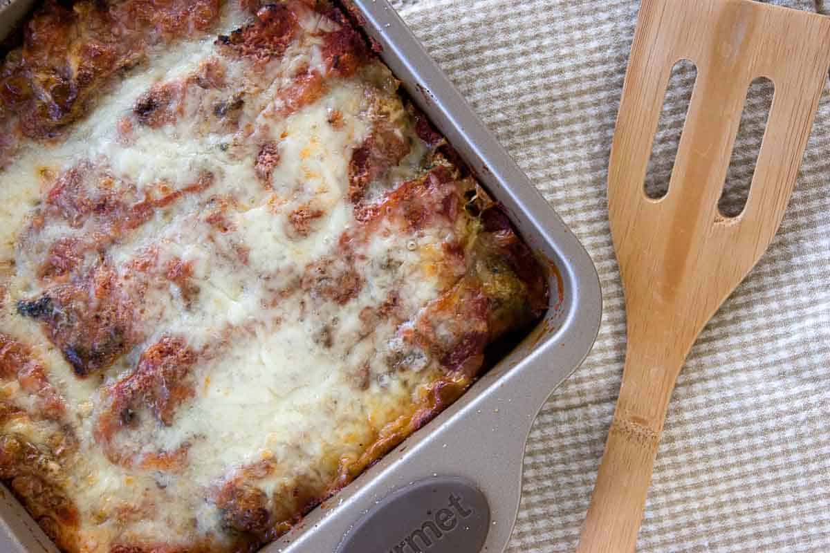 overhead view of a casserole dish of zucchini parmesan