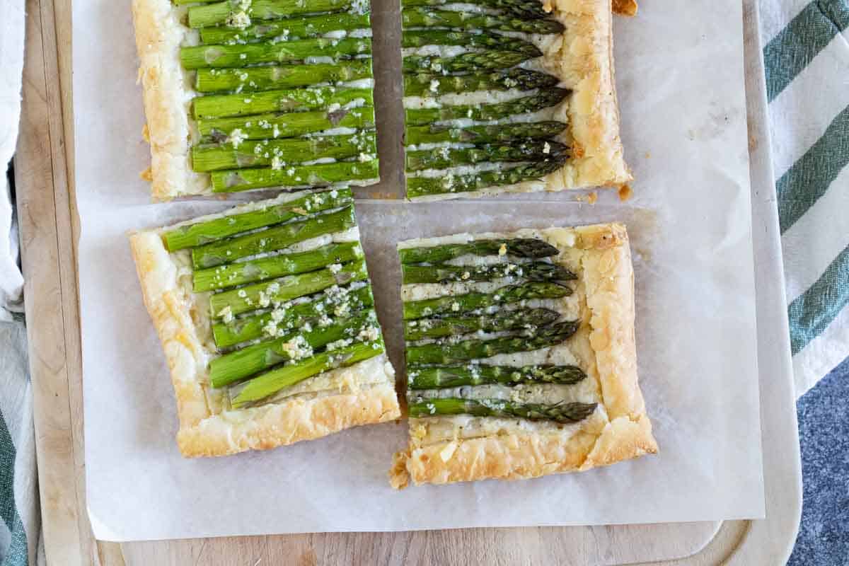 overhead view of asparagus tart cut into pieces