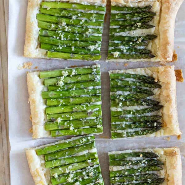 overhead view of full asparagus tart cut into 6 pieces