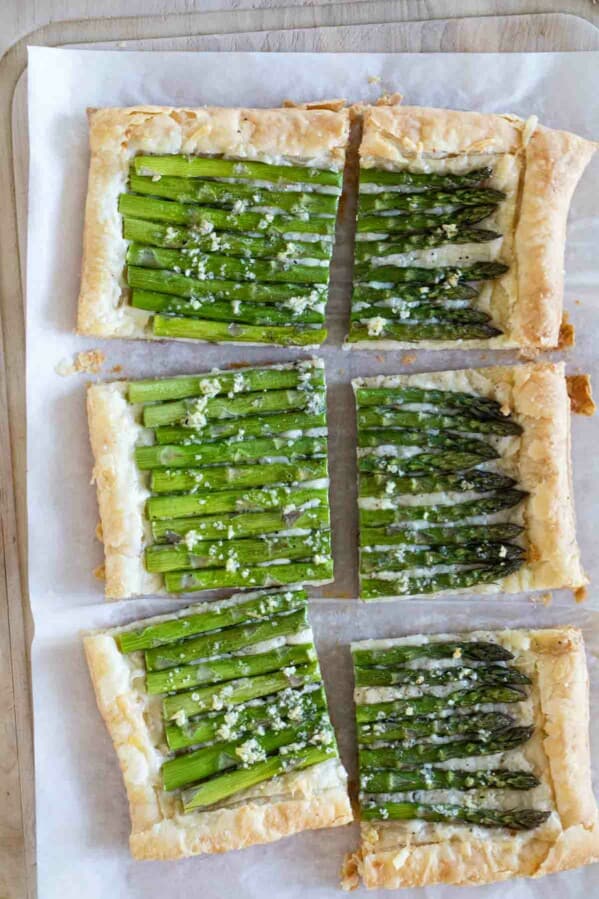 overhead view of full asparagus tart cut into 6 pieces