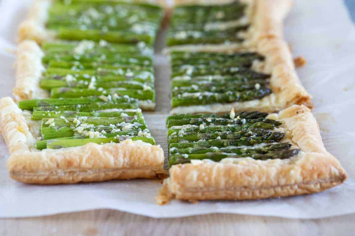 slices of asparagus tart made with puff pastry