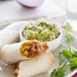 plate with Baked Mexican Egg Rolls and Enchilada Guacamole